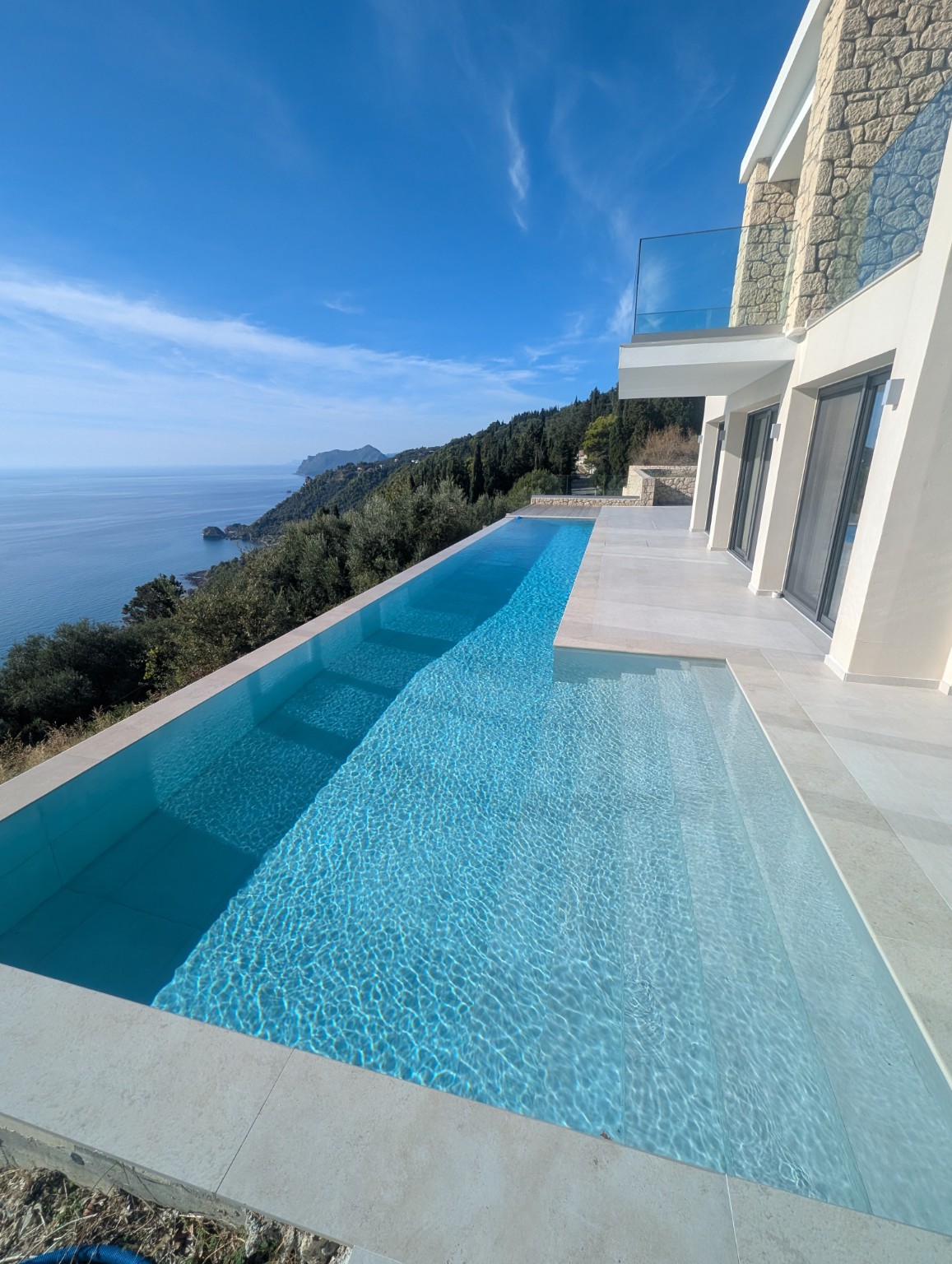 Infinity pool overlooking the Corfu coastline