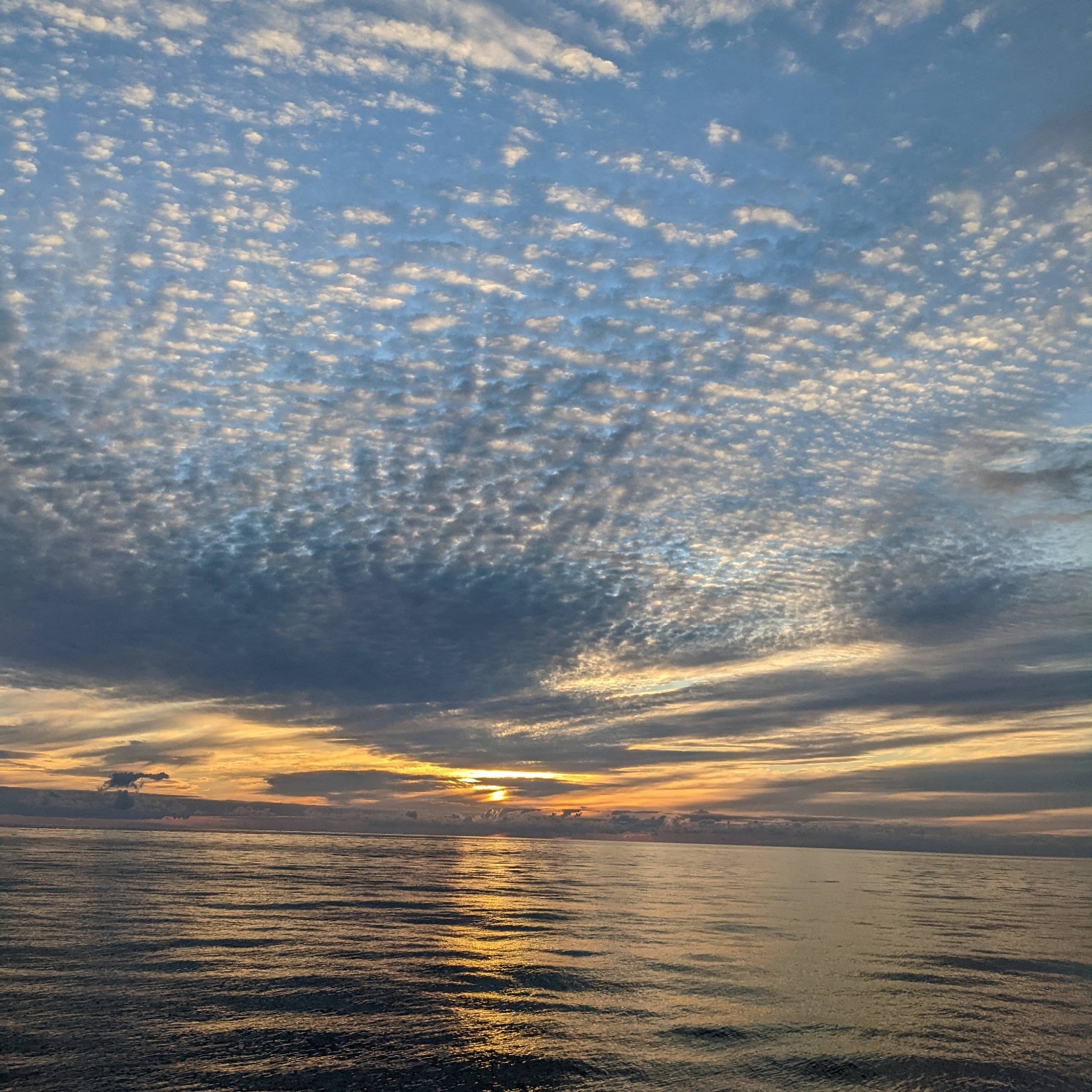 Cloud-filled evening sky over the Ionian Sea from Villa Norma